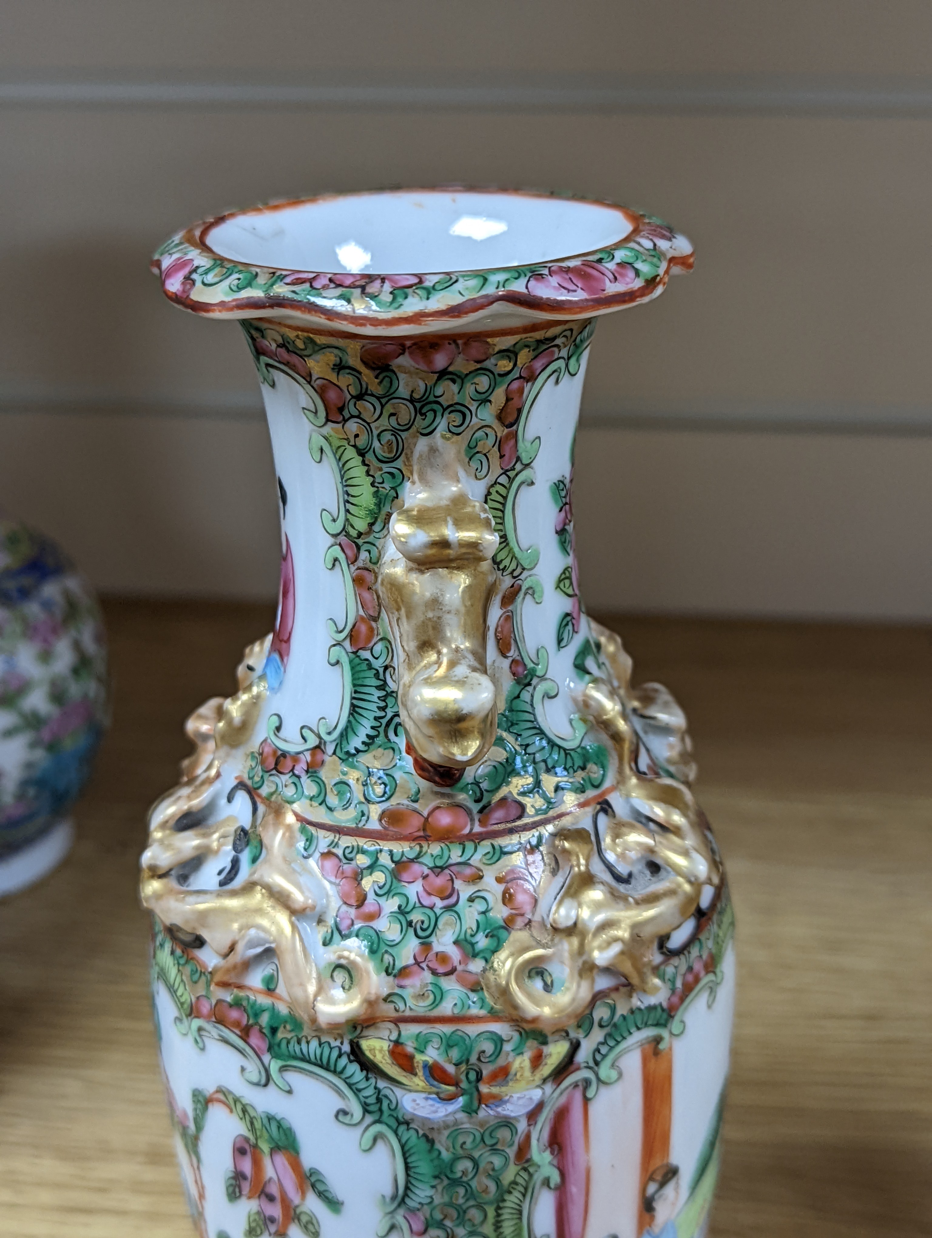 Four 19th century Chinese famille rose vases, 21cm